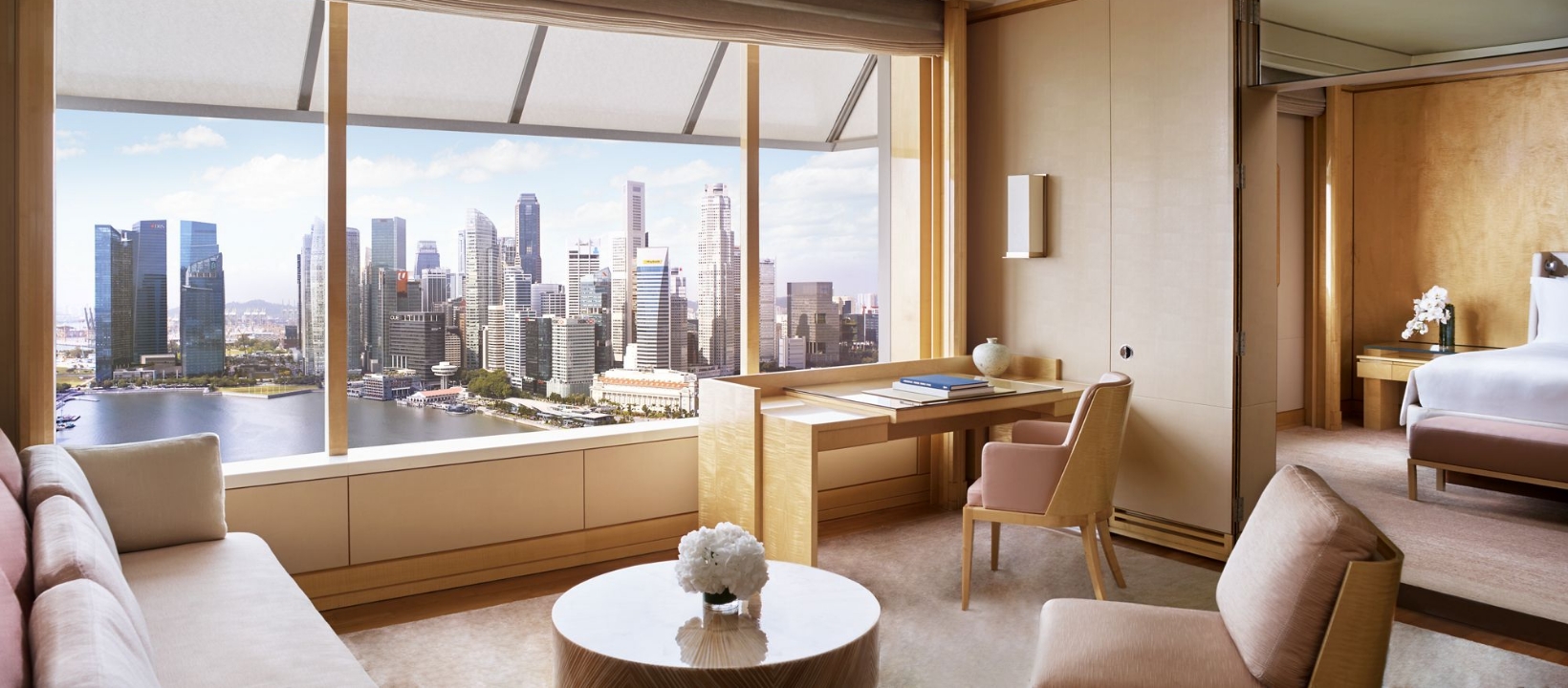 Ritz-Carlton deluxe suites with luxurious amenities and Singapore view